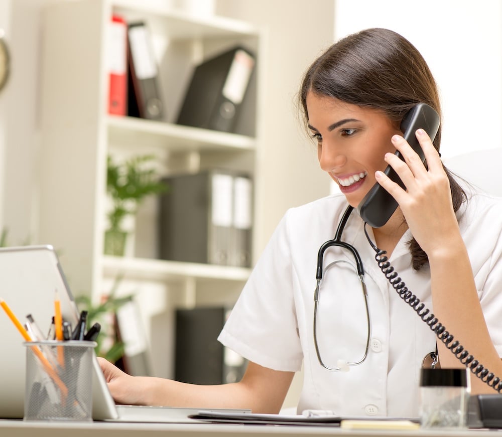 Nurse assisting patient remotely Nurse assisting patient remotely